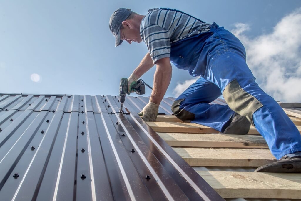 a man using a drill to drill a roof